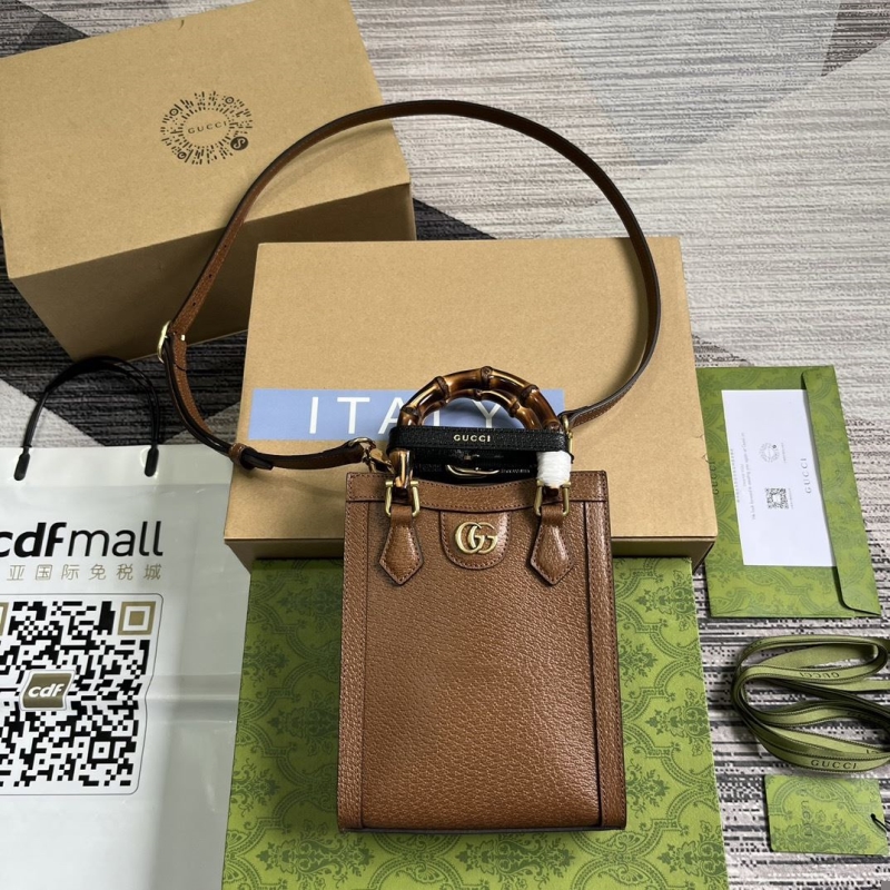 G*u*i top handle bags